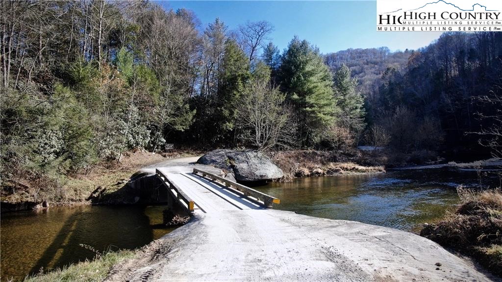 Riverside Drive Boone, NC 28607 - Photo 2 of 17 a view of a lake in a backyard