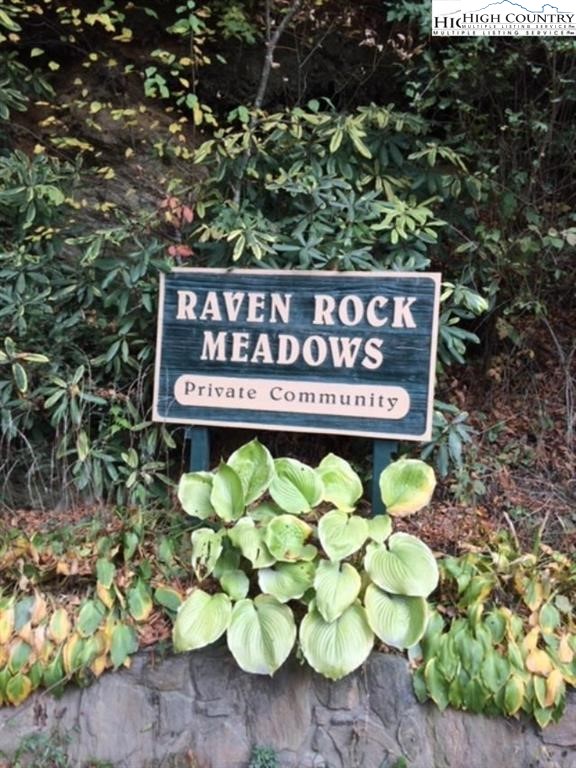 Riverside Drive Boone, NC 28607 - Photo 3 of 17 a sign broad in front of flowers