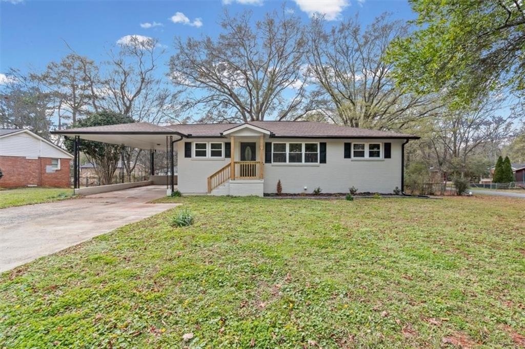 front view of house with a yard