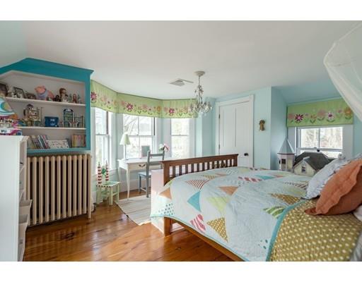 7 Labor In Vain Road Ipswich, MA 01938 - Photo 15 of 30 a view of a bedroom with furniture window and wooden floor