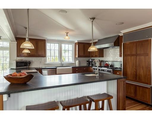 7 Labor In Vain Road Ipswich, MA 01938 - Photo 5 of 30 a kitchen with stainless steel appliances granite countertop a sink a stove and a refrigerator