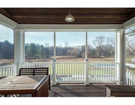 7 Labor In Vain Road Ipswich, MA 01938 - Photo 8 of 30 a view of a balcony with wooden floor and iron stairs