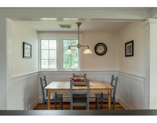 7 Labor In Vain Road Ipswich, MA 01938 - Photo 10 of 30 a view of a dining room with furniture and window