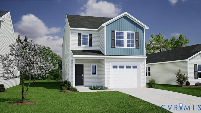 a front view of a house with a yard and trees