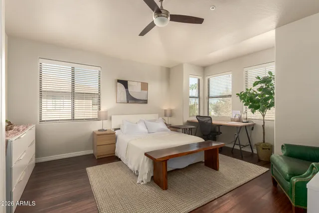 a bedroom with a bed and a television in it