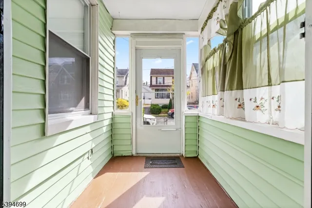 a view of bathroom with a shower and a sink