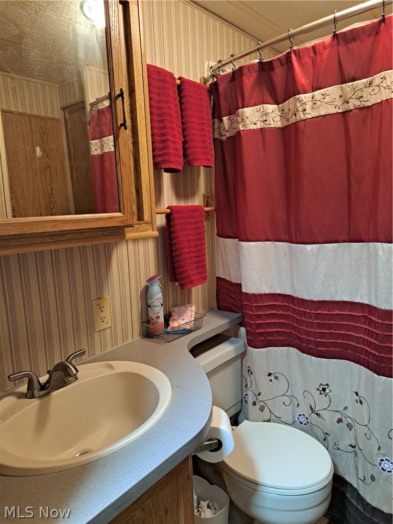 17875 Lashley Road, Unit 124 Senecaville, OH 43780 - Photo 32 of 45 Bathroom with toilet and vanity
