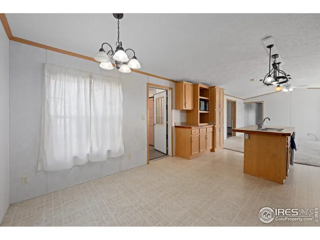 a room with furniture and a window