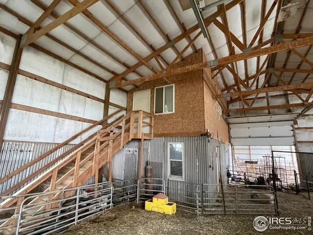 a view of backyard and entertaining space