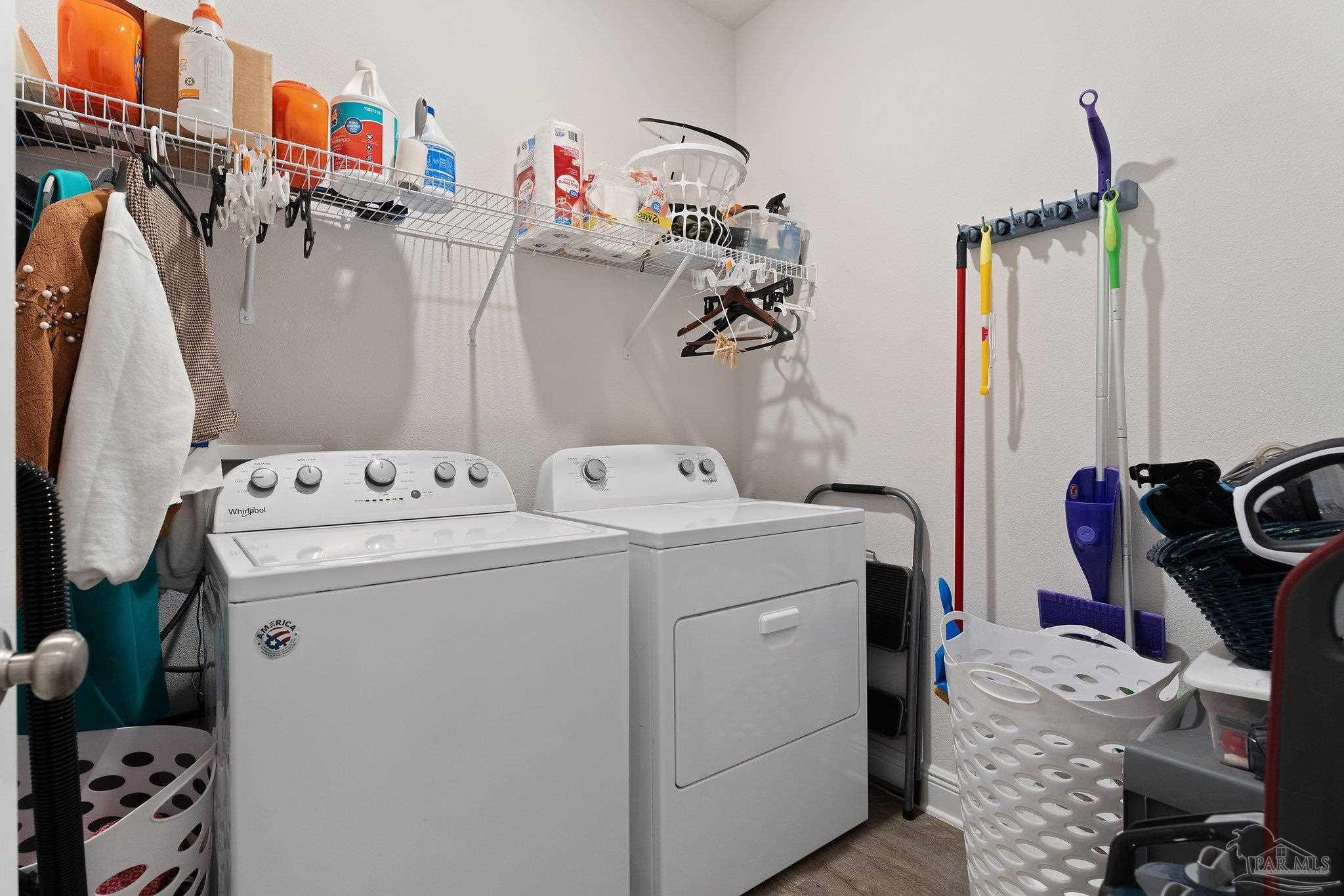 8038 Burnside Loop Pensacola, FL 32526 - Photo 14 of 44 a utility room with dryer and washer