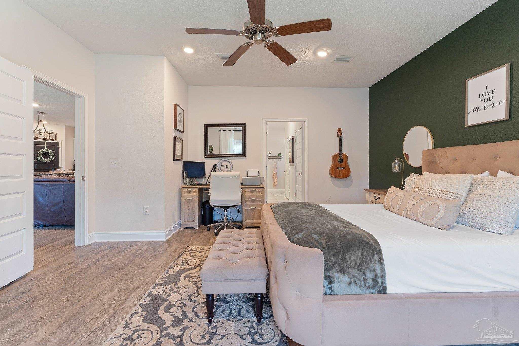 8038 Burnside Loop Pensacola, FL 32526 - Photo 26 of 44 a bed room with a bed and ceiling fan