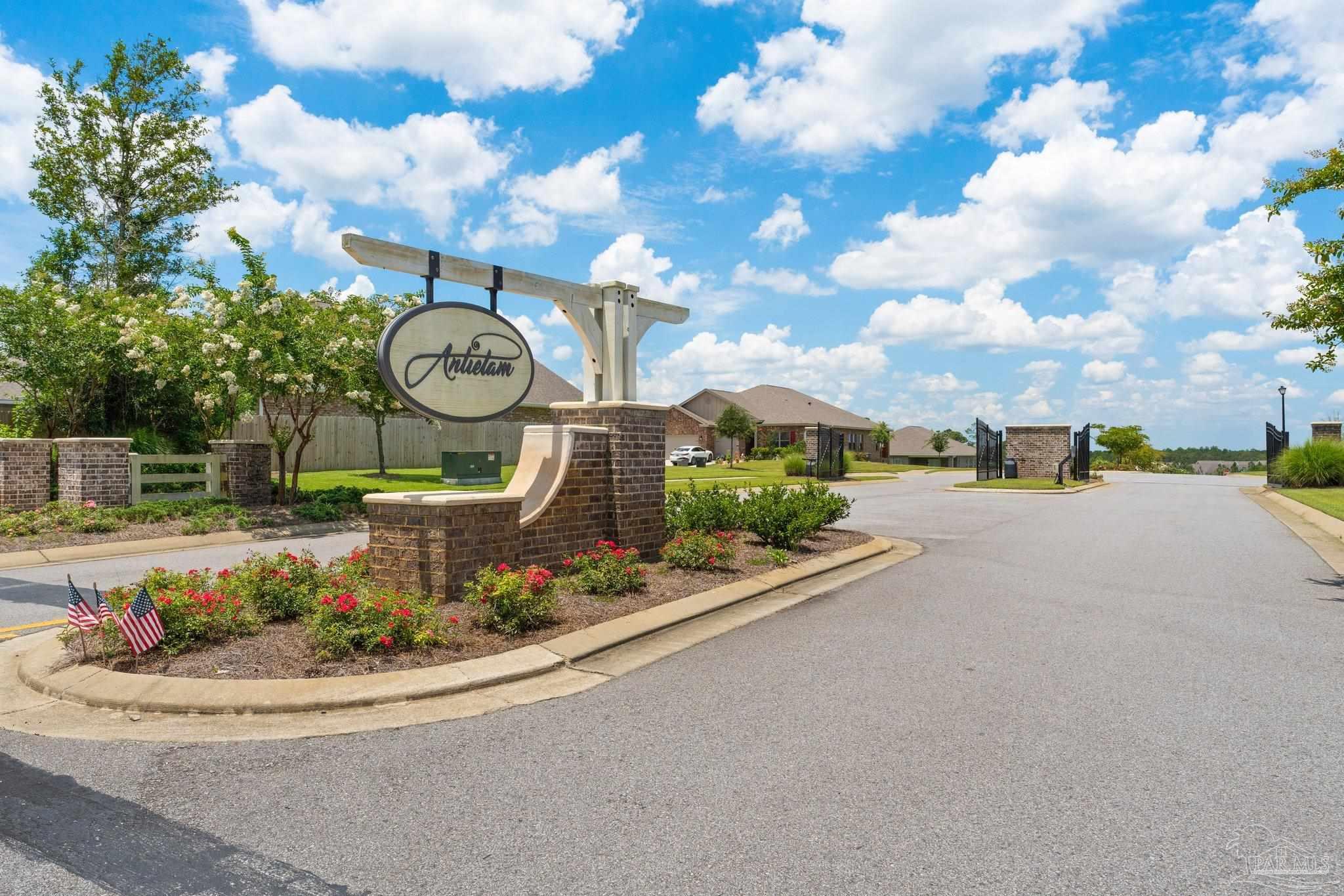 8038 Burnside Loop Pensacola, FL 32526 - Photo 36 of 44 a view of a house with a swimming pool and a chairs