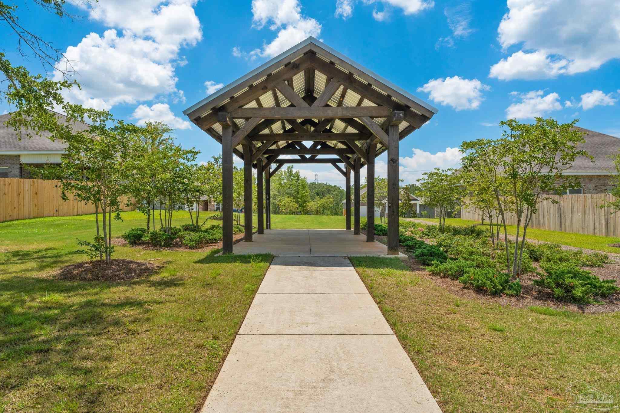 8038 Burnside Loop Pensacola, FL 32526 - Photo 38 of 44 a view of a pathway with a yard
