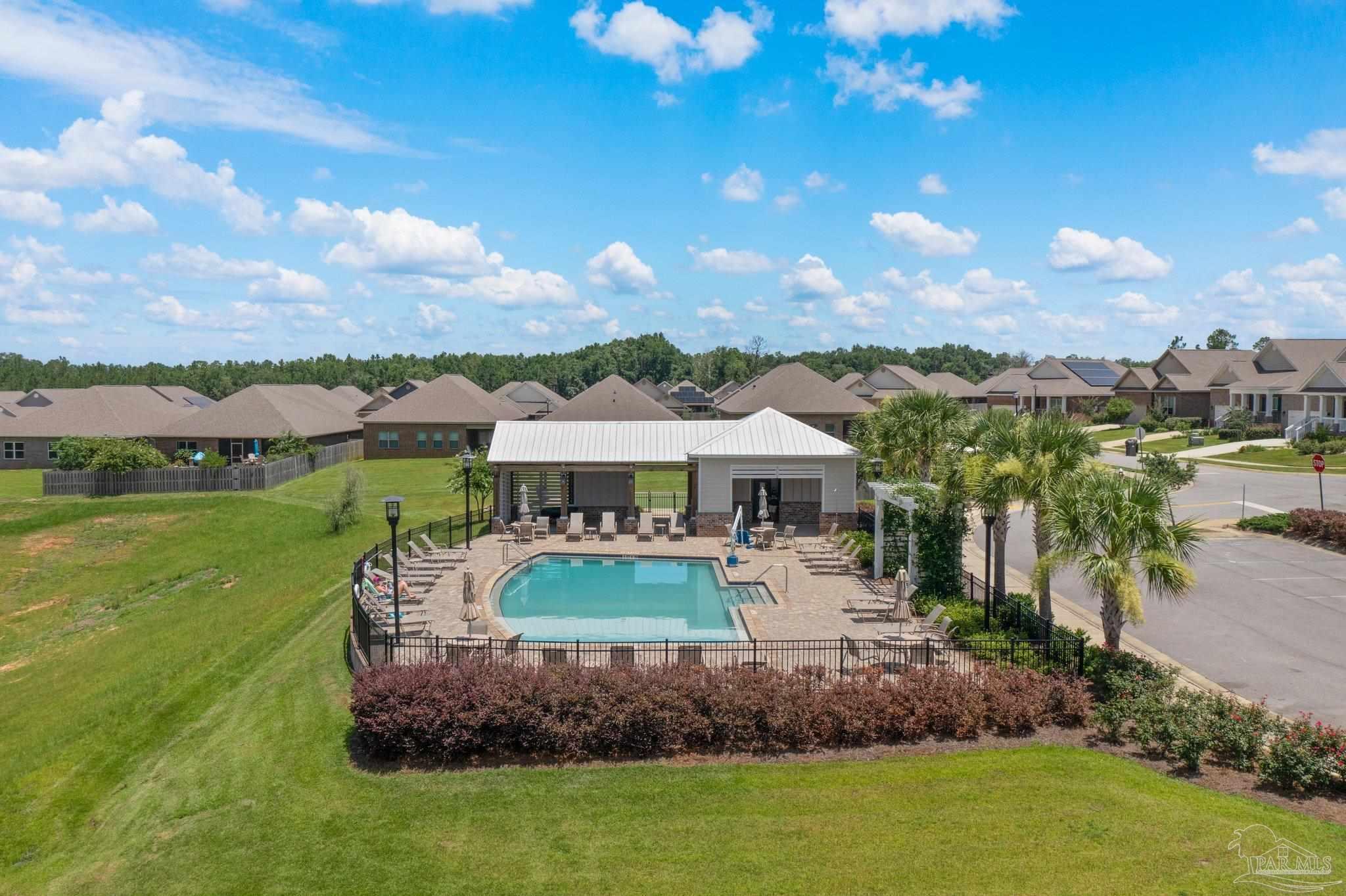 8038 Burnside Loop Pensacola, FL 32526 - Photo 39 of 44 a front view of a house with a garden