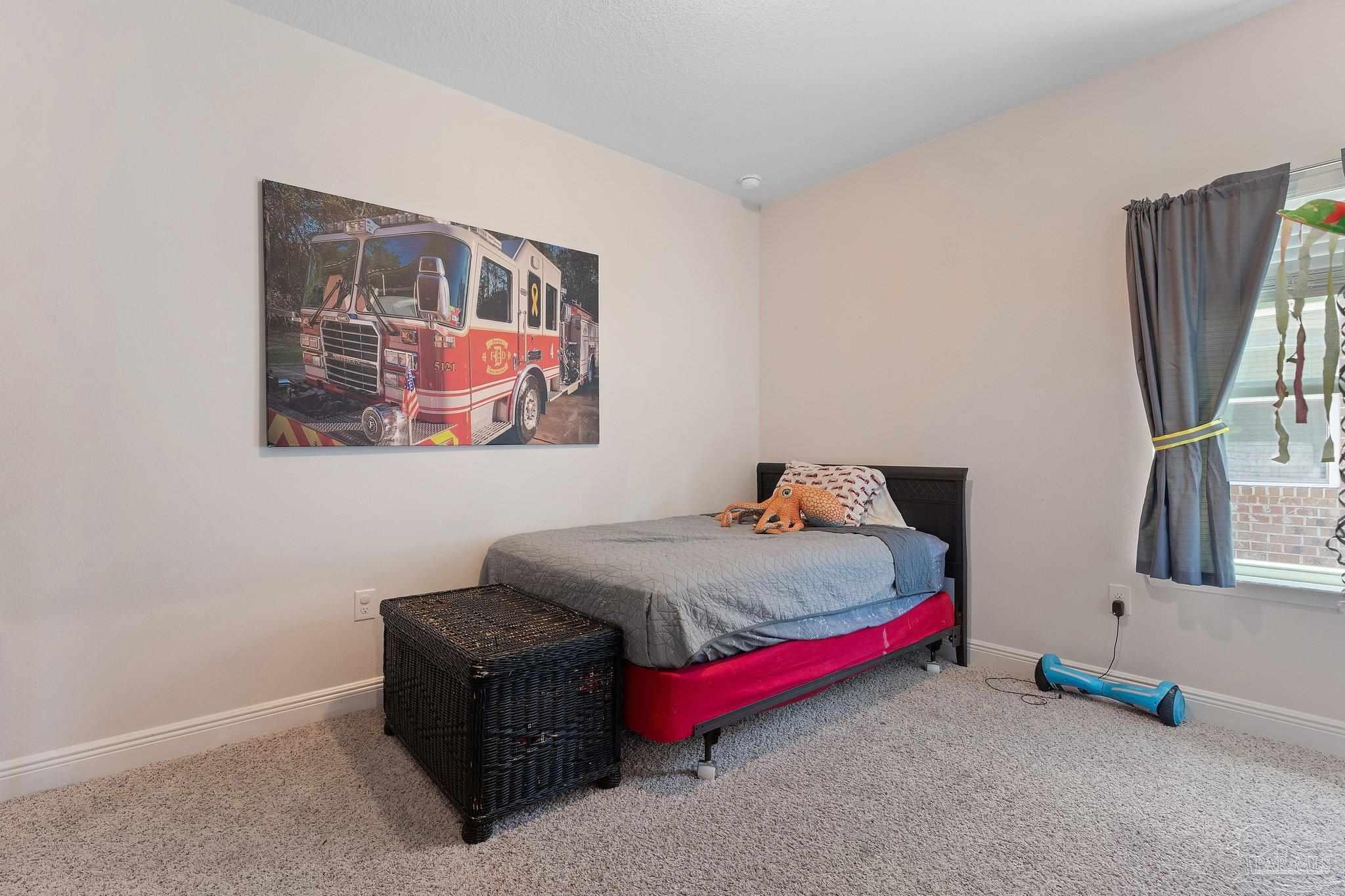 8038 Burnside Loop Pensacola, FL 32526 - Photo 10 of 44 a bedroom with bed and window