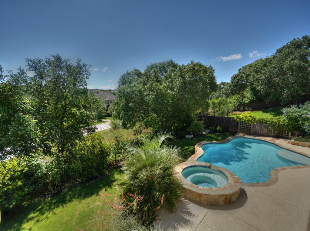 13224 Country Trails Lane Austin, TX 78732 - Photo 1 of 1 a view of a backyard of a house