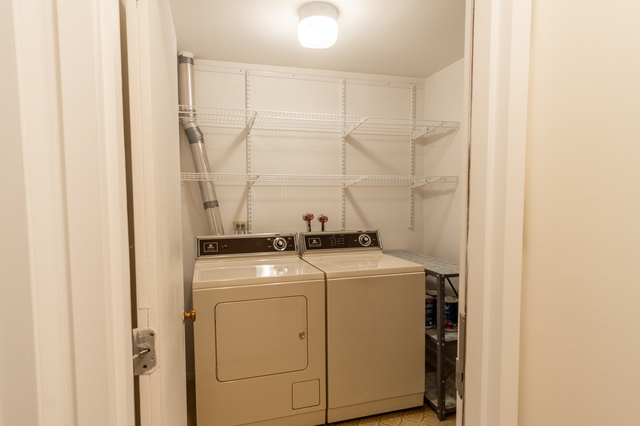 2610 Northampton Drive, Unit B1 Rolling Meadows, IL 60008 - Photo 14 of 16 a utility room with dryer and washer