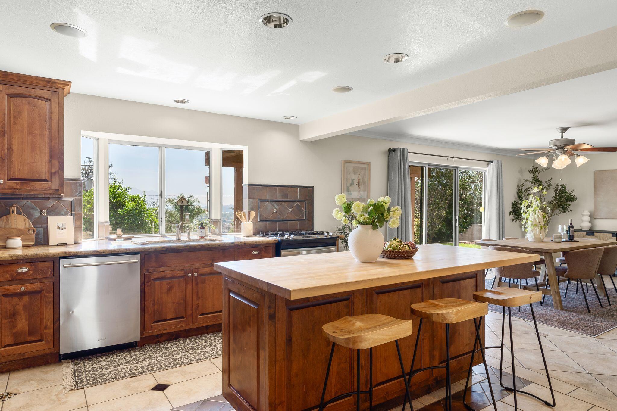 1000 Foothill Drive Fillmore, CA 93015 - Photo 19 of 86 a kitchen with granite countertop a sink and white appliances