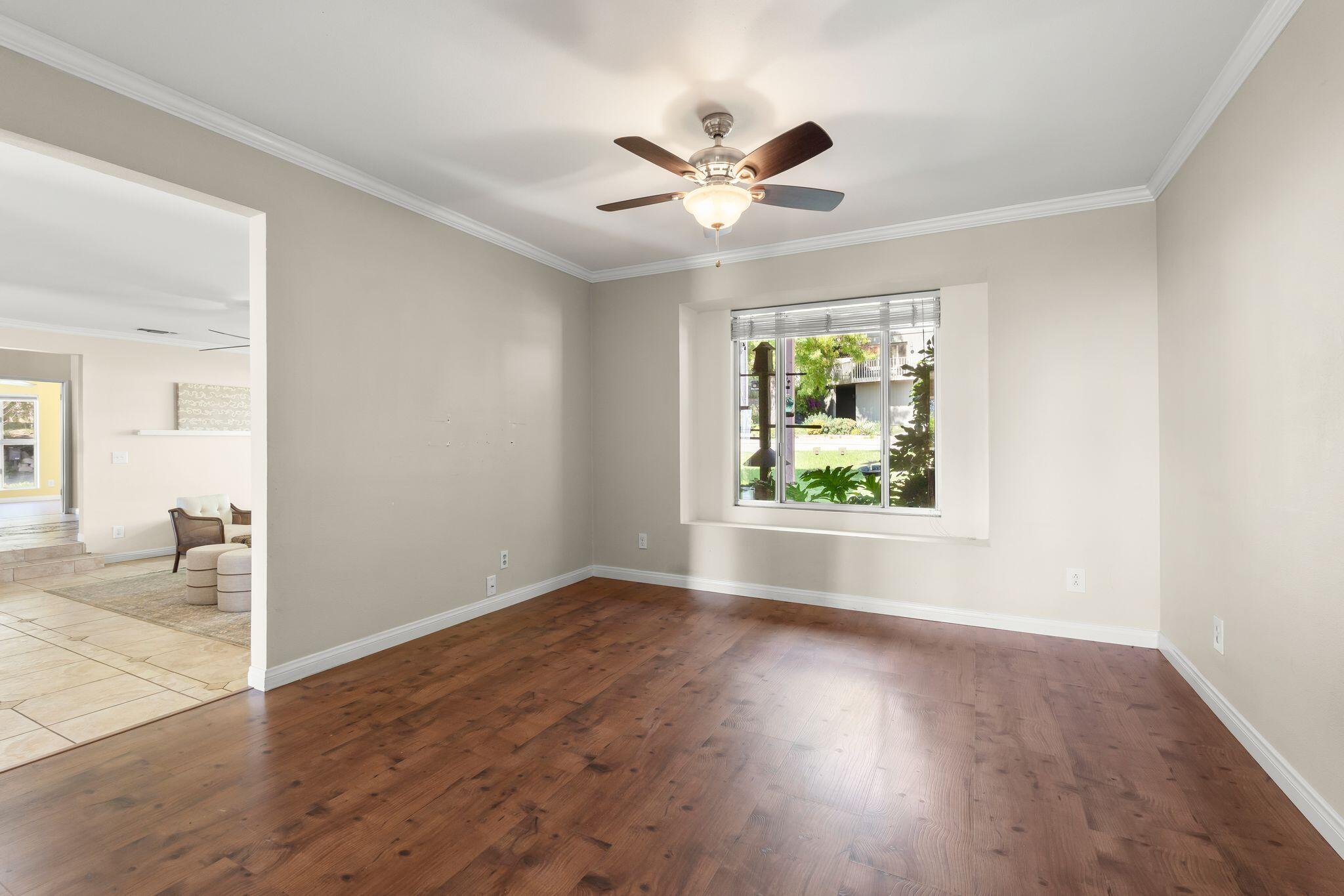 1000 Foothill Drive Fillmore, CA 93015 - Photo 22 of 86 a view of an empty room with wooden floor and a window