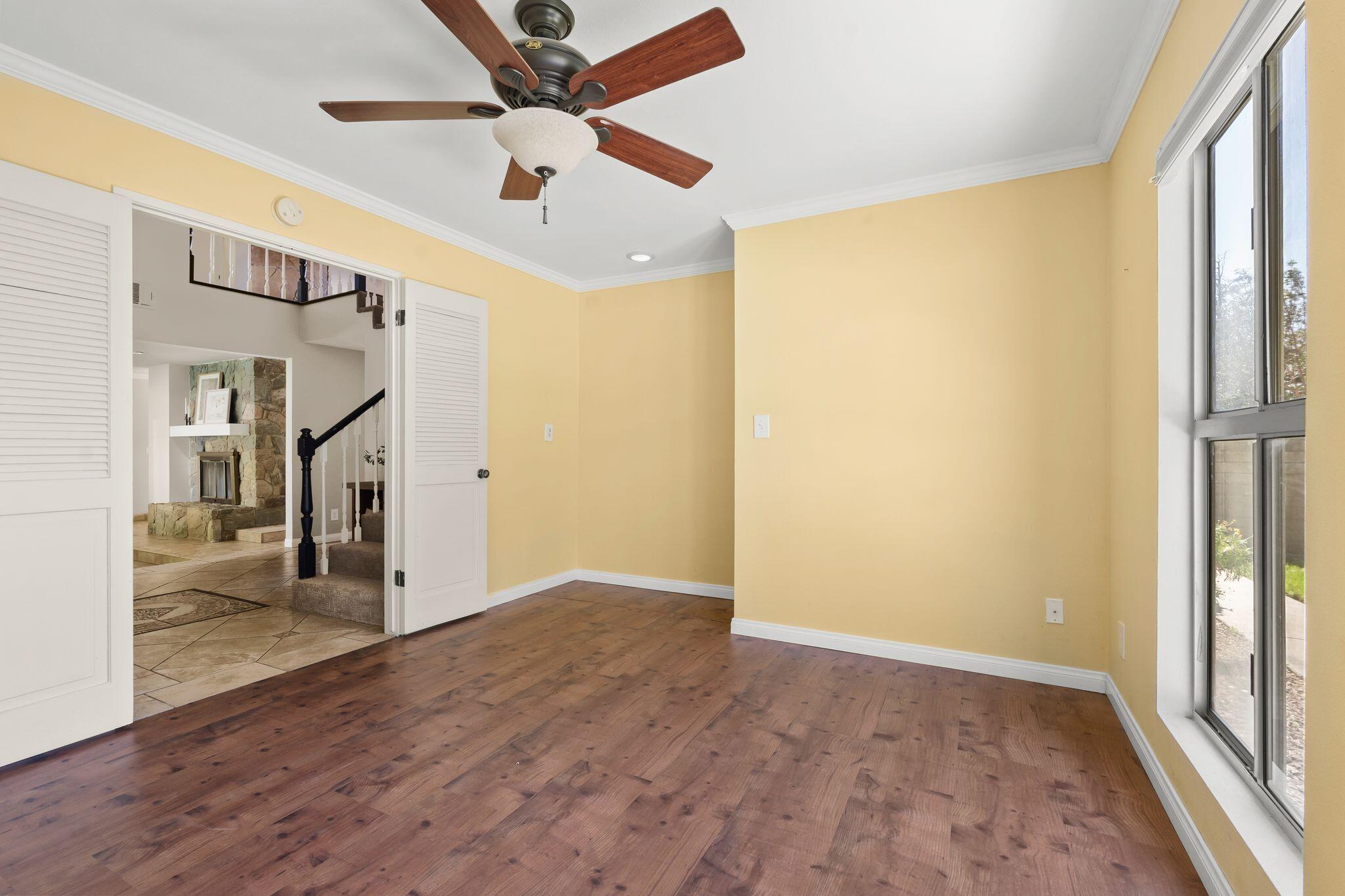 1000 Foothill Drive Fillmore, CA 93015 - Photo 23 of 86 a view of empty room with wooden floor and fan