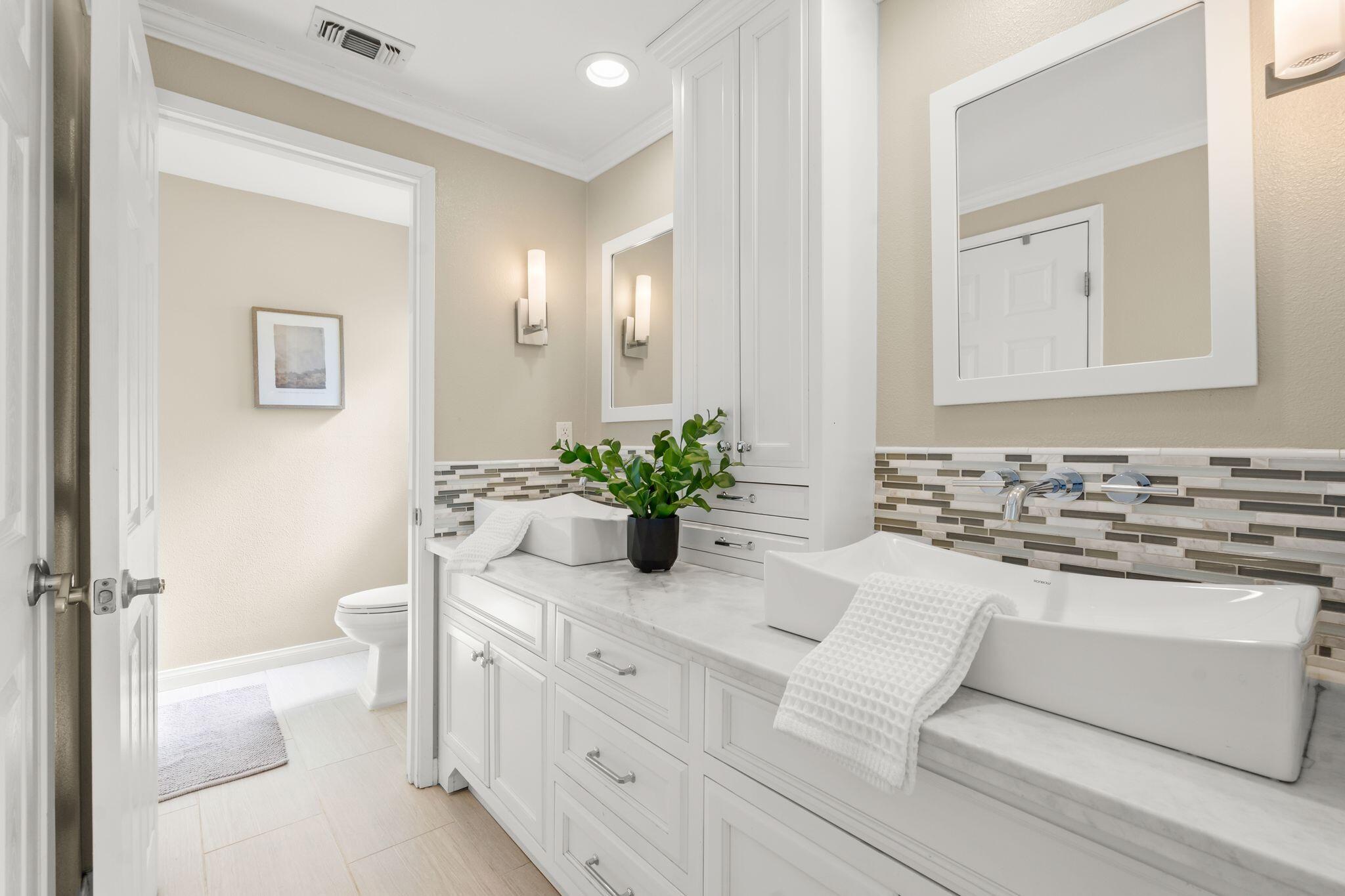 1000 Foothill Drive Fillmore, CA 93015 - Photo 30 of 86 a bathroom with a sink a toilet and a mirror