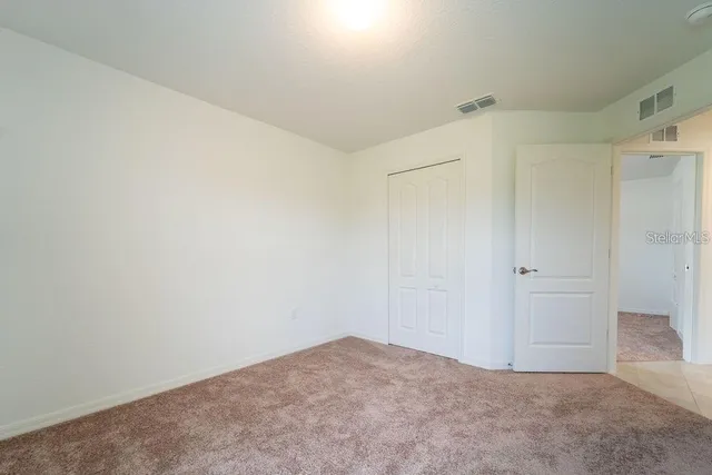 an empty room with a natural light