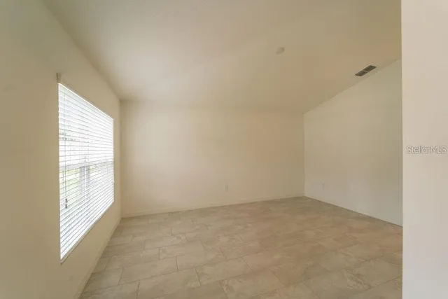 an empty room with an entryway