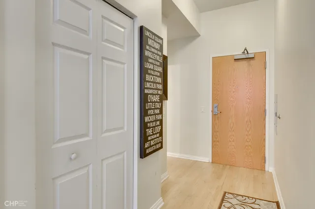 a white bath tub sitting next to a white toilet and sink