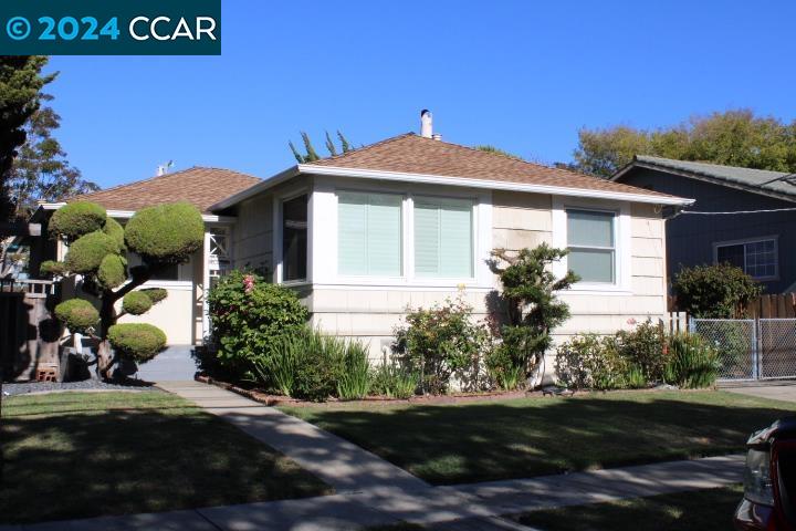 908 Everett Street El Cerrito, CA 94530 - Photo 1 of 27 a front view of a house with garden