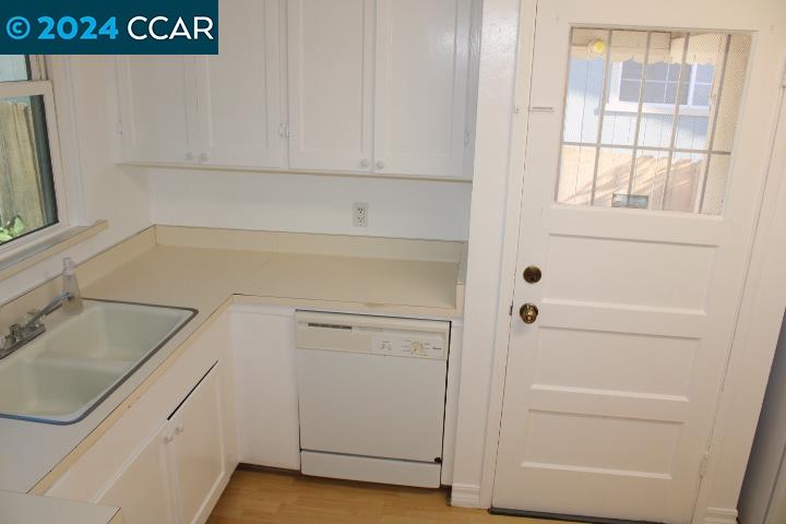 908 Everett Street El Cerrito, CA 94530 - Photo 12 of 27 a bathroom with a sink and a window