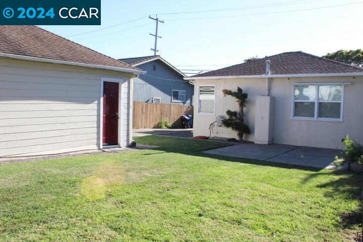 908 Everett Street El Cerrito, CA 94530 - Photo 26 of 27 a front view of a house with a yard