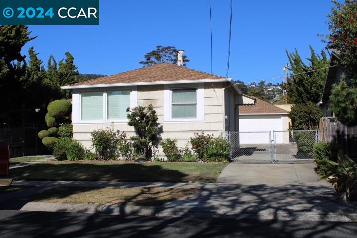 908 Everett Street El Cerrito, CA 94530 - Photo 27 of 27 a front view of a house with a yard