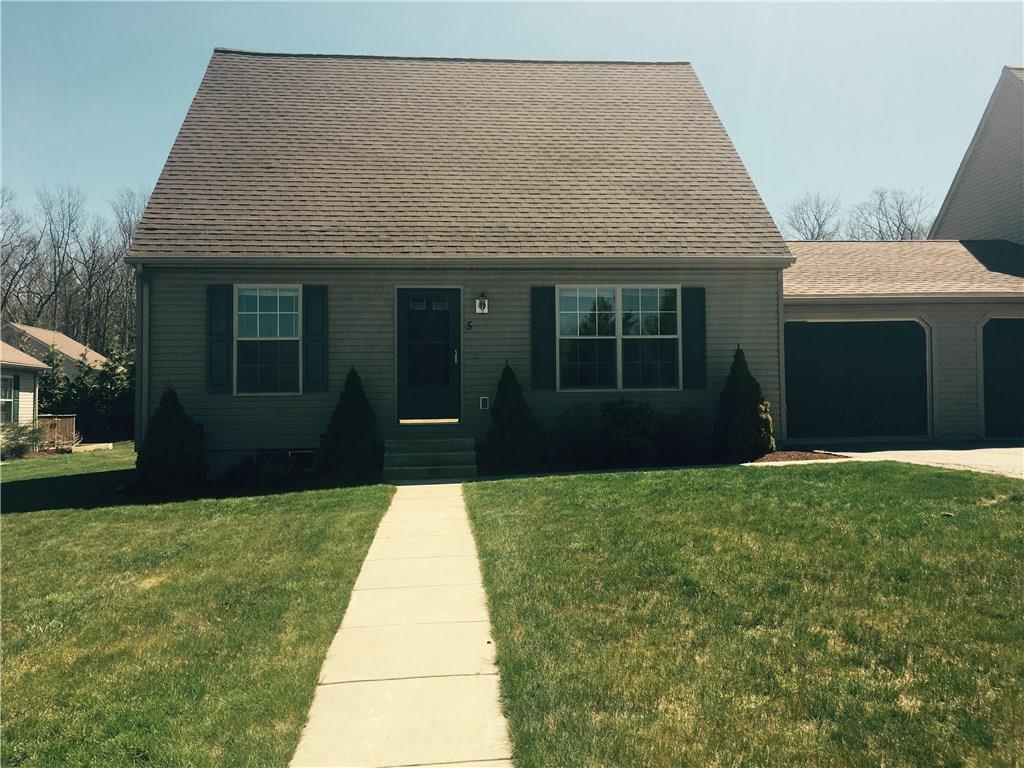 5 Mockingbird Drive, Unit 5 Killingly, CT 06239 - Photo 1 of 1 a front view of a house with a yard