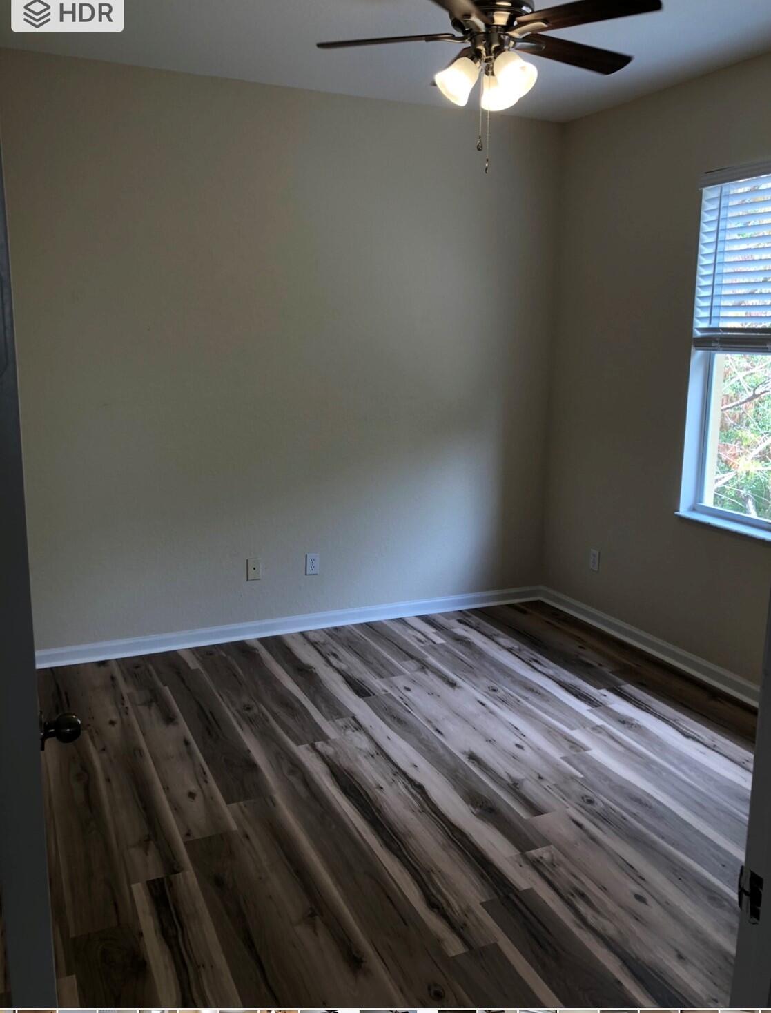 2031 Southeast Oldsmar Road Port St. Lucie, FL 34952 - Photo 12 of 14 a view of wooden floor