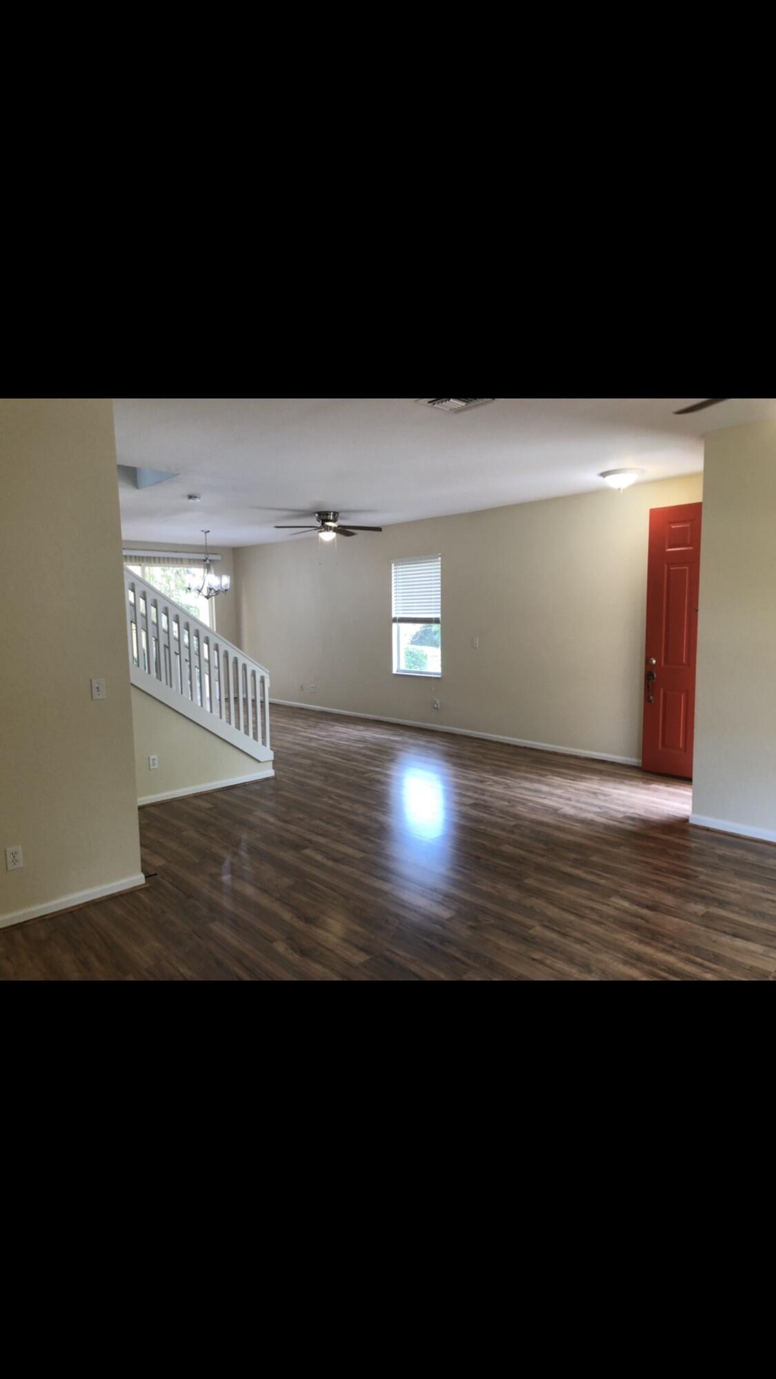 2031 Southeast Oldsmar Road Port St. Lucie, FL 34952 - Photo 4 of 14 a view of an empty space and window