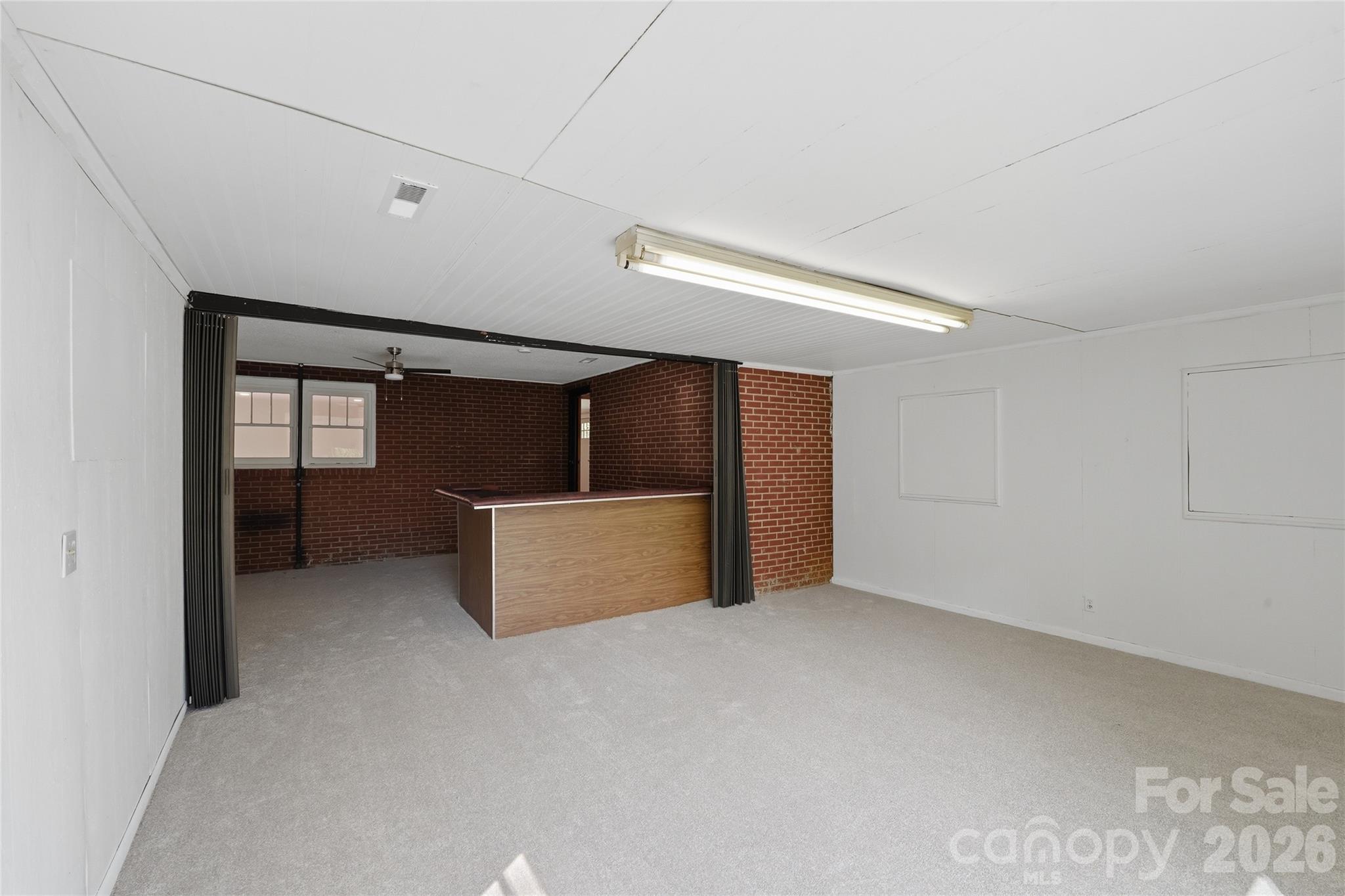 2231 Claremont Road Newton, NC 28658 - Photo 20 of 39 a view of an empty room with window