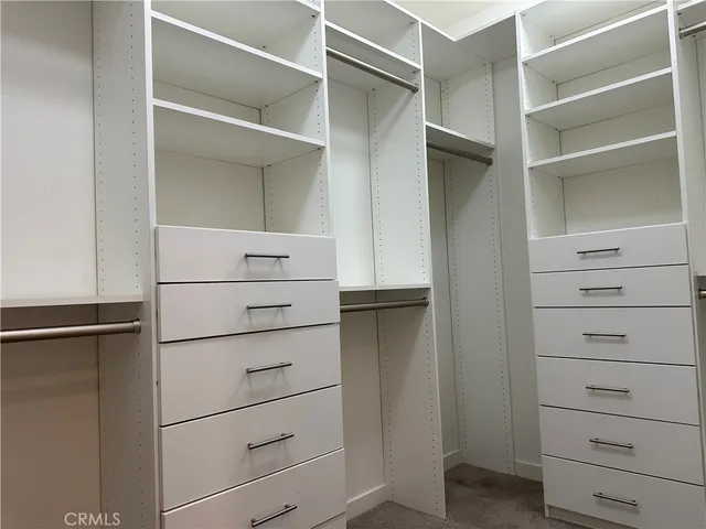 a utility room with cabinets