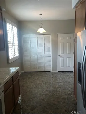 an empty room with a bathroom