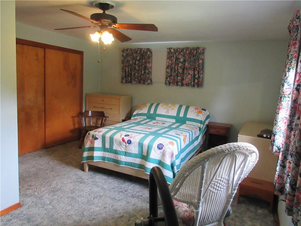 635 Fleming Road Sarver, PA 16055 - Photo 11 of 25 The master bedroom is 17 x 13', has a double closet and lighted ceiling fan.