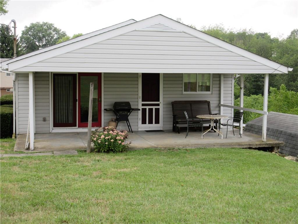 635 Fleming Road Sarver, PA 16055 - Photo 19 of 25 The 27' x 12' covered patio has entrances into the dining room and the living room.