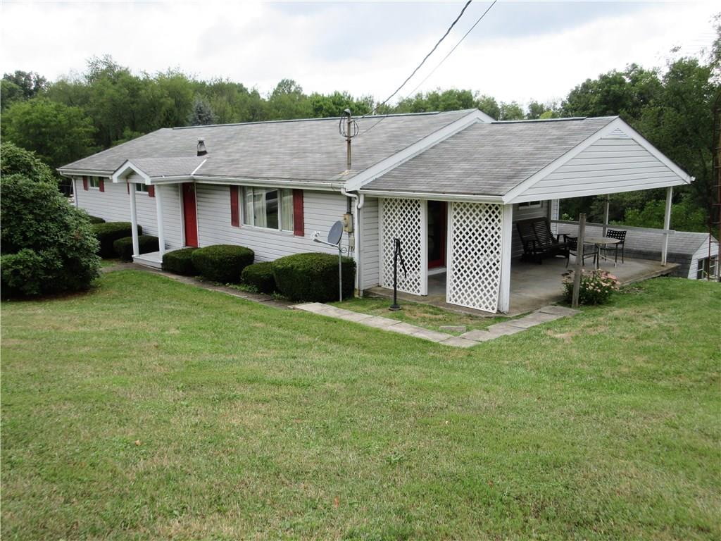 635 Fleming Road Sarver, PA 16055 - Photo 21 of 25 View of the side of the house with covered patio.