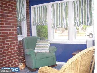 1 Grant Street Riverside, NJ 08075 - Photo 4 of 12 a living room with furniture and a large window