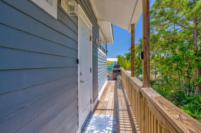 a view of balcony and yard
