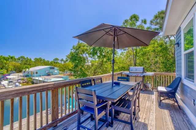 a view of balcony with furniture and outdoor seating