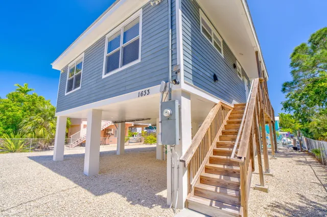 a view of outdoor space deck and tree