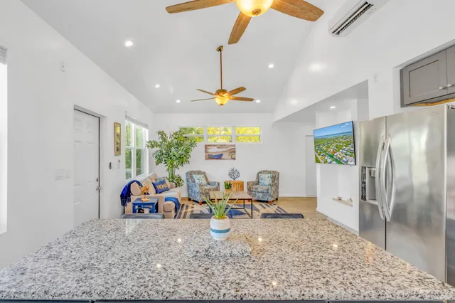 a view of a living room and dining room