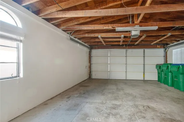 a view of an ocean with a building in the background