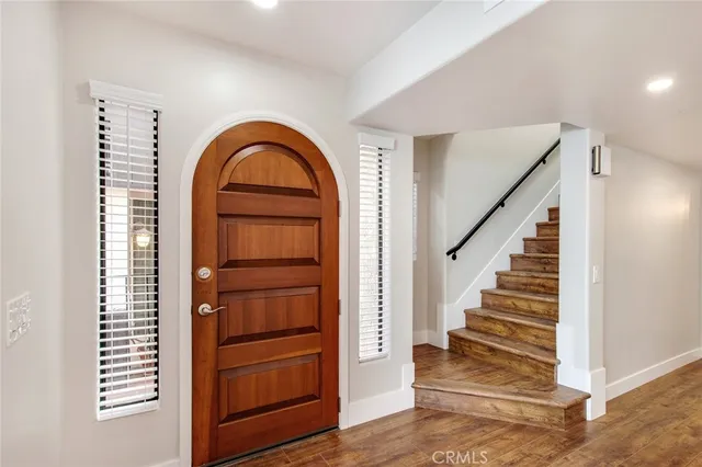 a view of entryway with wooden floor