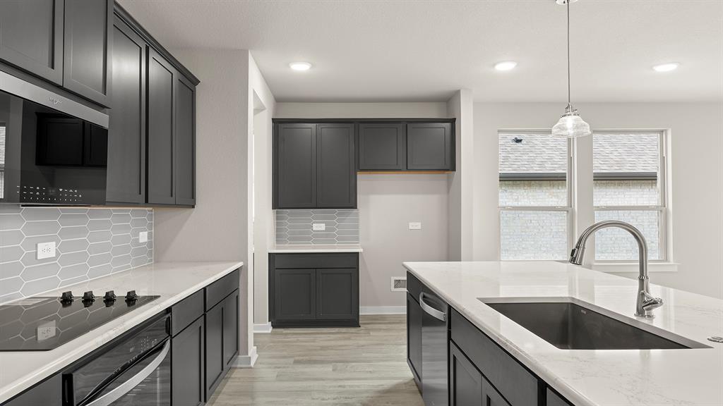 1101 Rushing Court Aubrey, TX 76227 - Photo 6 of 31 12. 1101 Rushing - Kitchen (4)