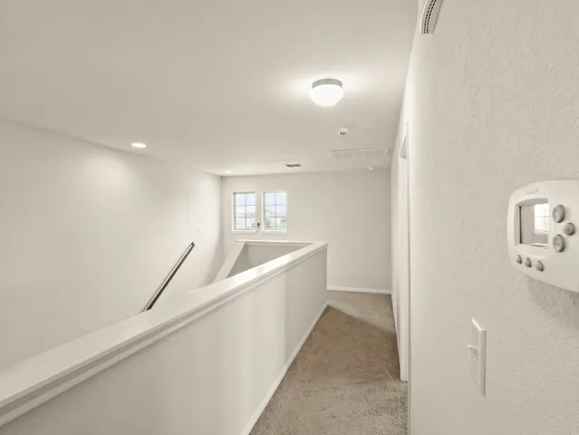 a bathroom with a bathtub and a sink